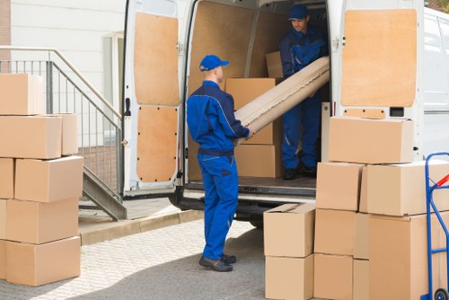 Professional local removals team loading boxes in Kenton