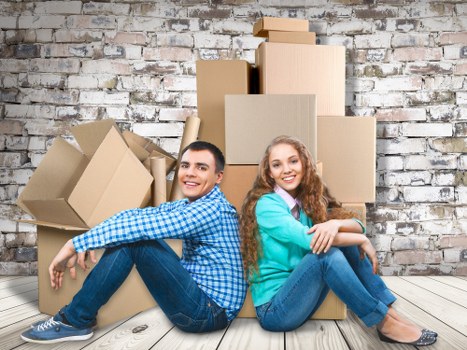Apartment moving team handling furniture in Kenton
