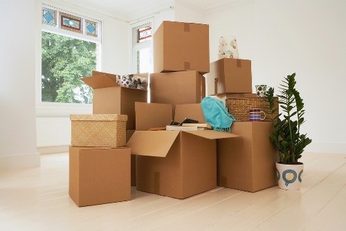 A family packing boxes for mobile self storage in Kenton during a move